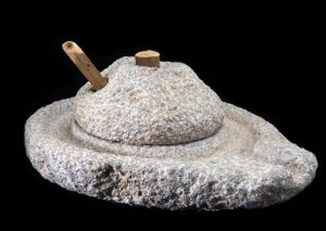 Imagen de un molino antiguo para cereales de piedra